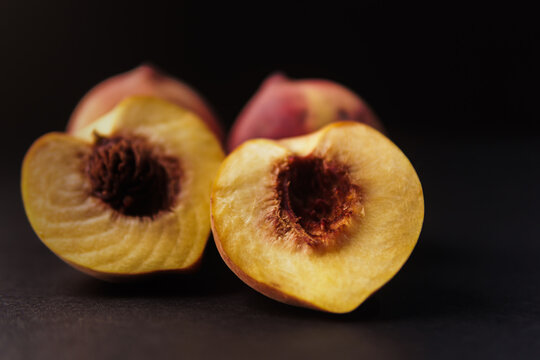 peaches on black background