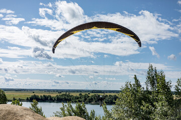 A paraglider on the sky