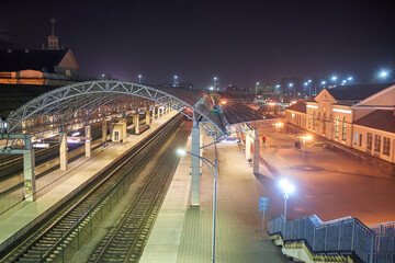 Fototapeta na wymiar Brest, Belarus - October 22, 2020 - View of the night railway station in Brest