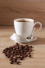 white cup of coffee, coffee beans