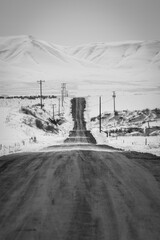 Long lonely country road in the winter on the yakima indian reservation