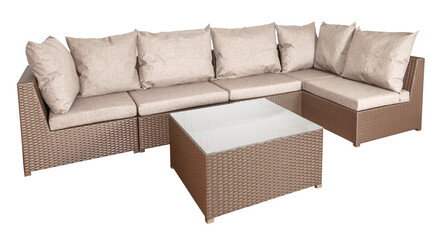 Wicker rattan corner sofa and coffee table for the garden or lounge area.