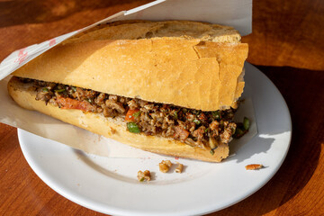 Traditional local Turkish street food. Kokorec with bread
