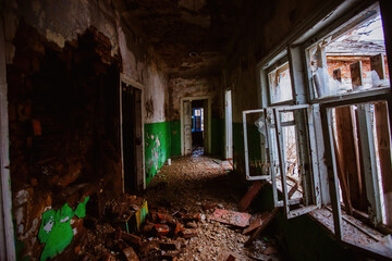 Dark dirty corridor of old abandoned building
