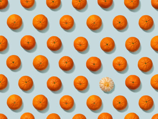 Tangerines on a sky-blue background. Seamless pattern, for packaging paper. Find the differences.