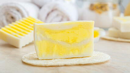 Natural handmade soap bars. Yellow soap bar nature diy cosmetic made from olive oil butter. Toiletries and Bath cosmetic product for hygiene skincare. Long web banner.