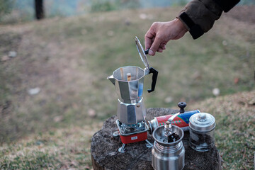 Travel, camping and dripping coffee in the mountains of northern Thailand in the morning with beautiful views.
