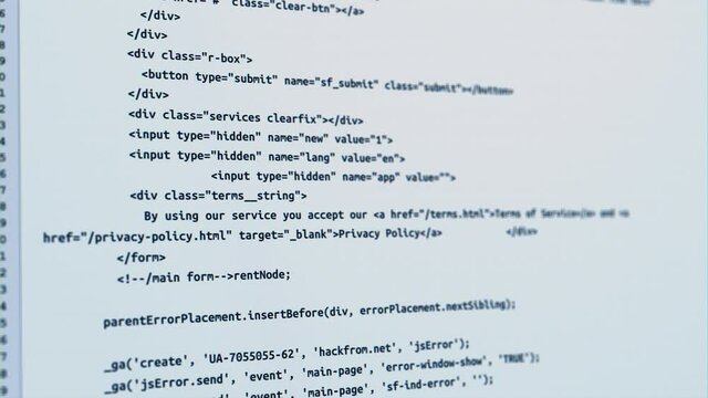 Computer codes are projected on the screen while it is being typed or written Animation. Computer screen with encrypted fast typing coding symbols. Network security, programming, development.