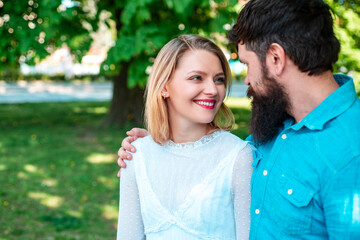 Fototapeta premium Love and tenderness. Couple looks each other outdoor.