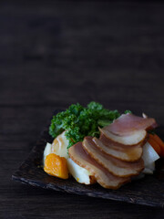 Duck Salad on Dark Background with Copy Space. Rustic Duck Salad Dark Food Photography Still Life.