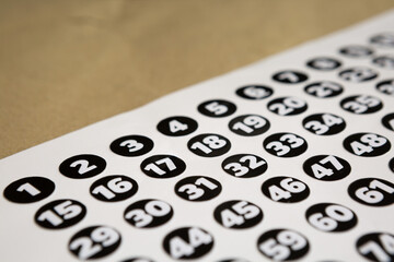 Selective focus of Multipurpose number stickers used  for counting things or people and others