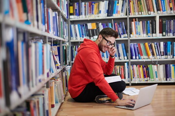 the students uses a notebook, laptop and a school library