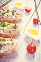 Vintage photo, Crusty sandwiches with fresh mackerel fish paste, healthy nutrition concept