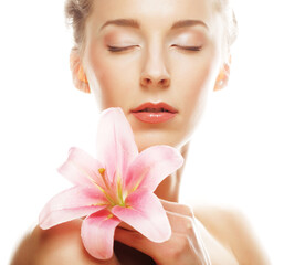 Beauty face of woman with pink lily