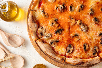 Closeup on baked mushrooms and cheese pizza on the white background