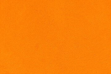 Flat orange concrete wall texture background.