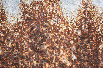 The old and dirty rusty galvanized sheet for roof and fence . rusty texture background 
