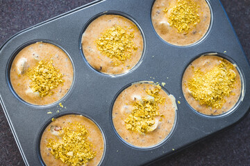 vegan savoury muffins with olives and nutritional yeast before getting baked, healthy plant-based food
