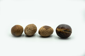 Mumbai , India - 15 March 2021, Nutmeg or Jaifal Spice on white background at Mumbai Maharashtra India
