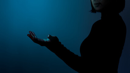 Female hand gesture with giving virtual thing