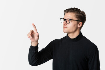 Man using an interactive transparent touch screen