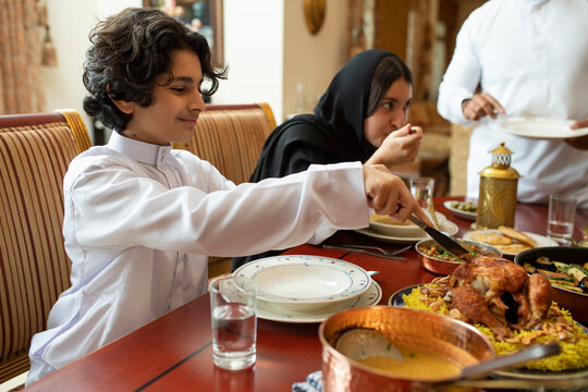 Arabian family having dinner, Arabian family eating iftar in Ramadan