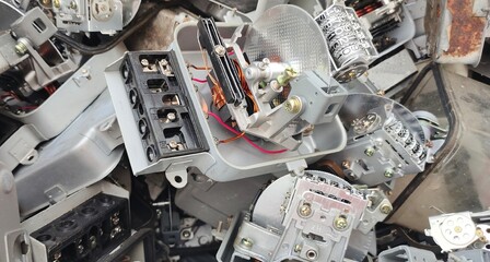 Old electric meter damages, placed in the crate.