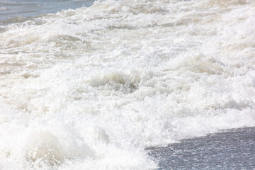 Wave on the seashore as a background.
