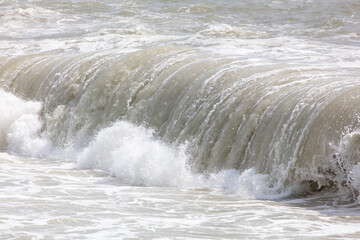 Wave on the seashore as a background.