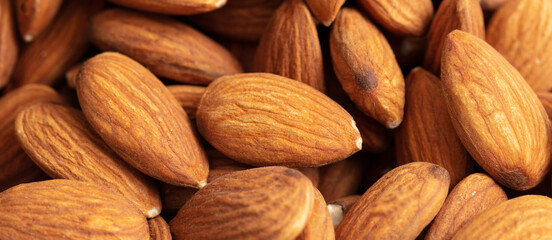 Close up of almond nuts as background.