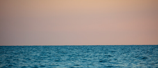 Horizon on the sea at sunset.