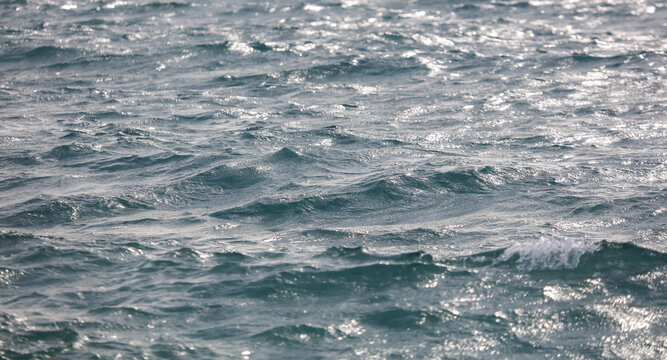 The smoothness of the water in the sea. © schankz