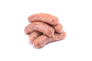 Raw pork sausages.Grilled sausages in close-up, isolated on a white background.Selective focus.