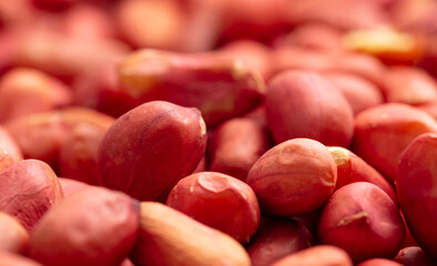 Close up of peanut nuts as background. Macro