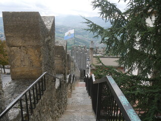 Fototapeta premium San Marino, the Walls. Closeup of the battlements of the walls that start from the castle and surround the old town.