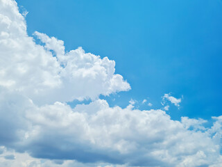Naklejka na ściany i meble Blue sky background with big clouds