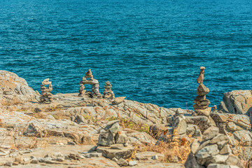 Handmade Stone figures by the sea 