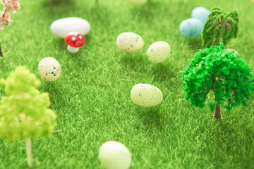 Easter eggs on green grass. Fairy tale