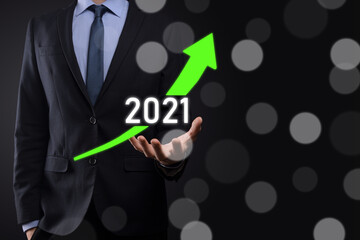Plan business positive growth in year 2021 concept. Businessman plan and increase of positive indicators in his business, Growing up business concepts.
