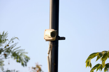 image of closed-circuit television installed on iron bar