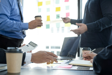 Meeting business team leaders about charts, financial graphs showing results are analyzing and calculating planning strategies, business success building processes