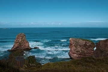 Fototapeta premium Rocks in the sea with low tide