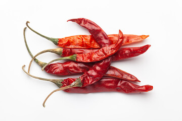 Macro close-up of Organic red chili pepper( Capsicum annuum)  on white background. Pile of Indian Aromatic Spice. Top view