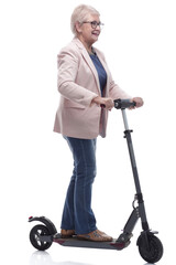 in full growth. happy adult woman with electric scooter.