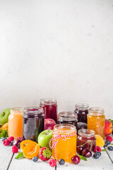 Fototapeta na wymiar Assortment of berries and fruits jams