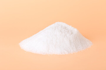 Heap of salt on color background