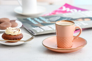Cup of coffee on table in cafe