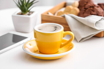 Cup of coffee on table in cafe