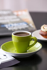 Cup of coffee on table in cafe