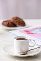 Cup of coffee on table in cafe